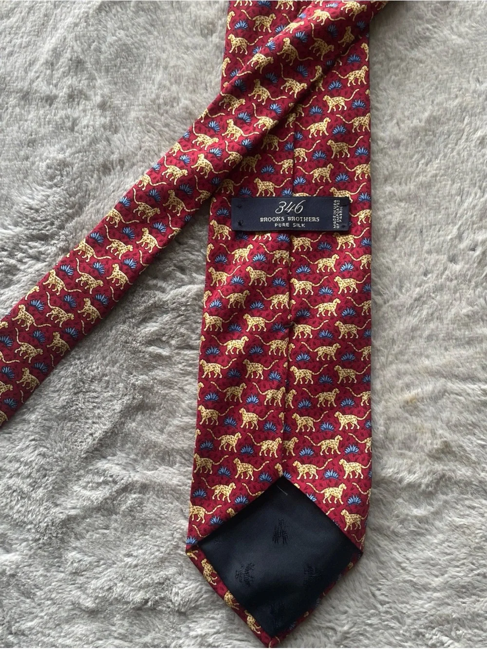 Brooks Brothers Red Silk Tie with Yellow Animal Motif and Blue Accents